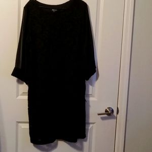 Plus size women black lace dress.